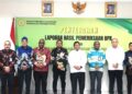 Kepala Perwakilan BPK Provinsi Papua,Bhuono Agung Nugroho Menyerahkan LHP Kinerja Atas Efektifitas Kegiatan Operasional Bank Papua Kepada Ketua DPR Papua,Denny Henrry Bonai,ST.MM.,MH.