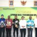 Kepala Perwakilan BPK Provinsi Papua,Bhuono Agung Nugroho Menyerahkan LHP Kinerja Atas Efektifitas Kegiatan Operasional Bank Papua Kepada Ketua DPR Papua,Denny Henrry Bonai,ST.MM.,MH.